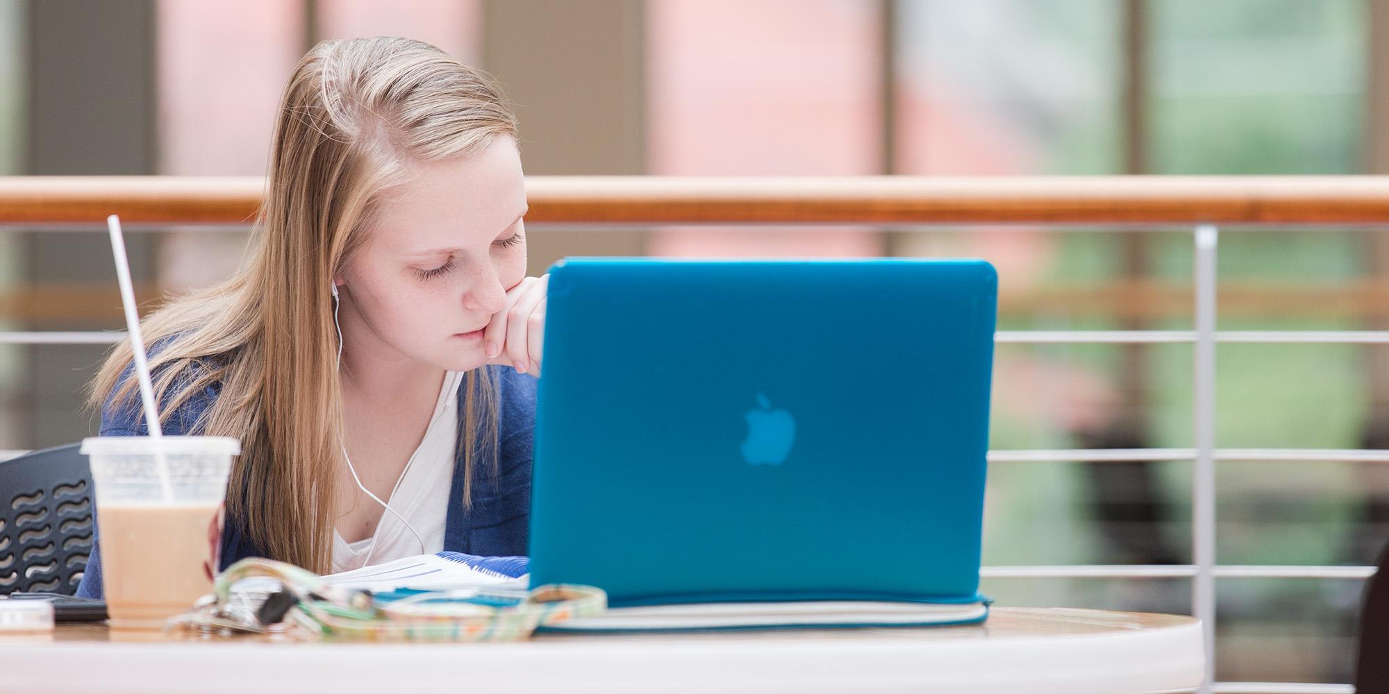 Female Student Studying Independently